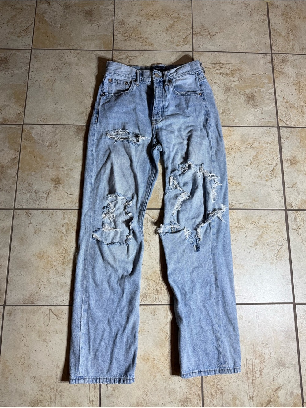 Ripped 90s style jeans